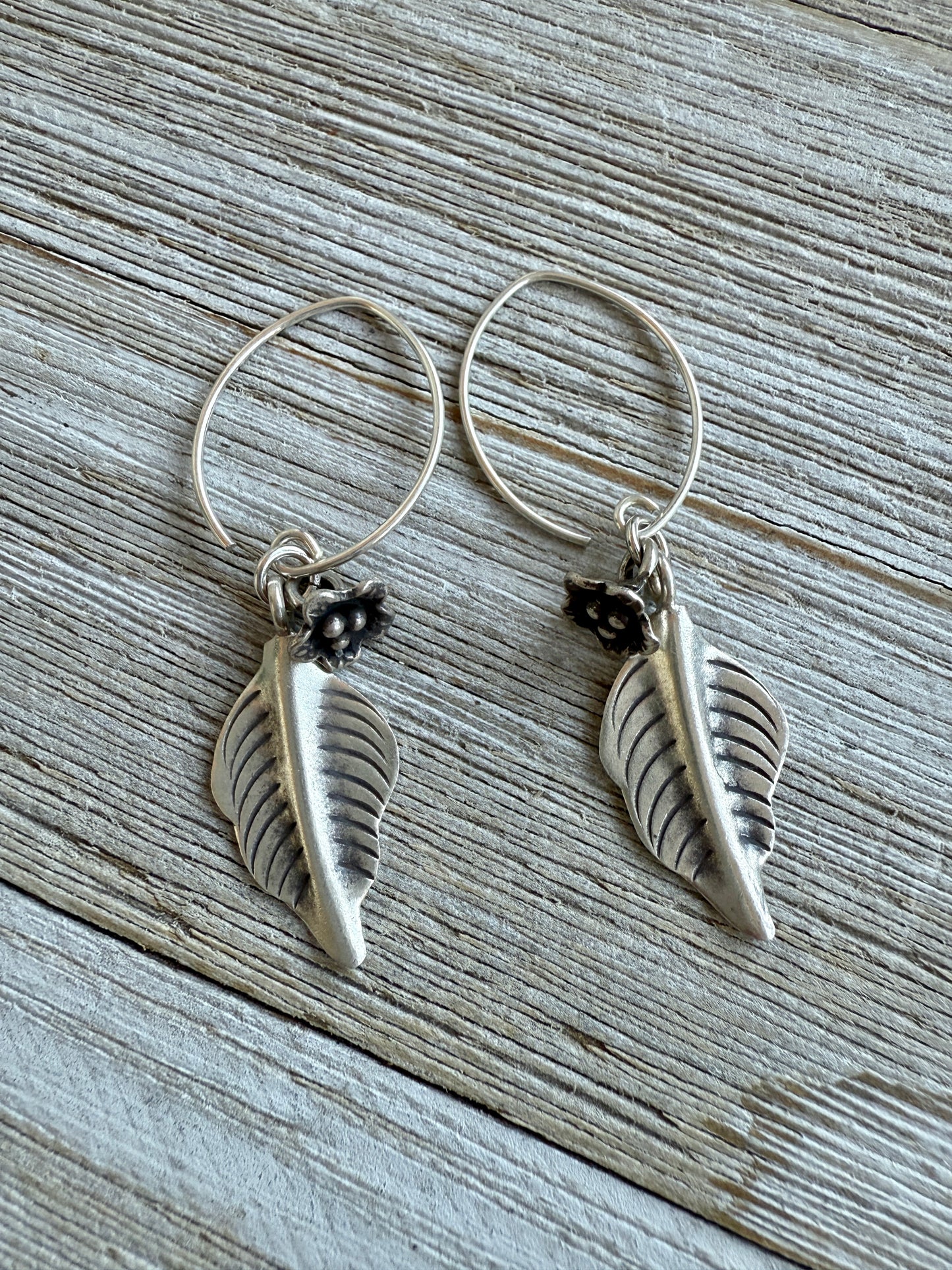 Handmade fine silver leaves and flowers earrings with fine silver ear wires.