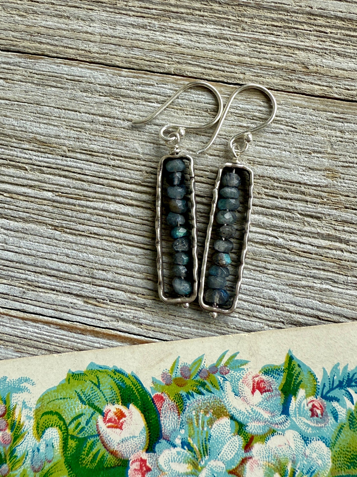 Labradorite in fine silver frames on fine silver ear wires. Earrings.