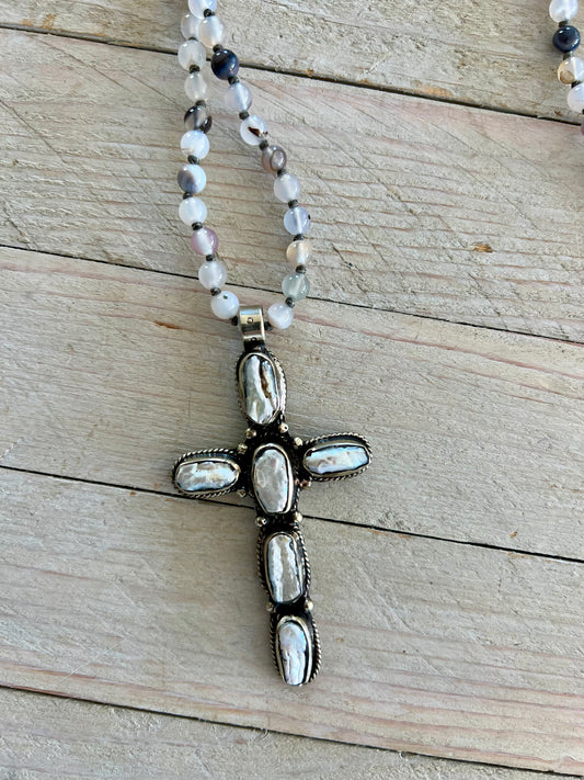 Pearl cross on knotted agates with fine silver heart accent. 44” necklace.