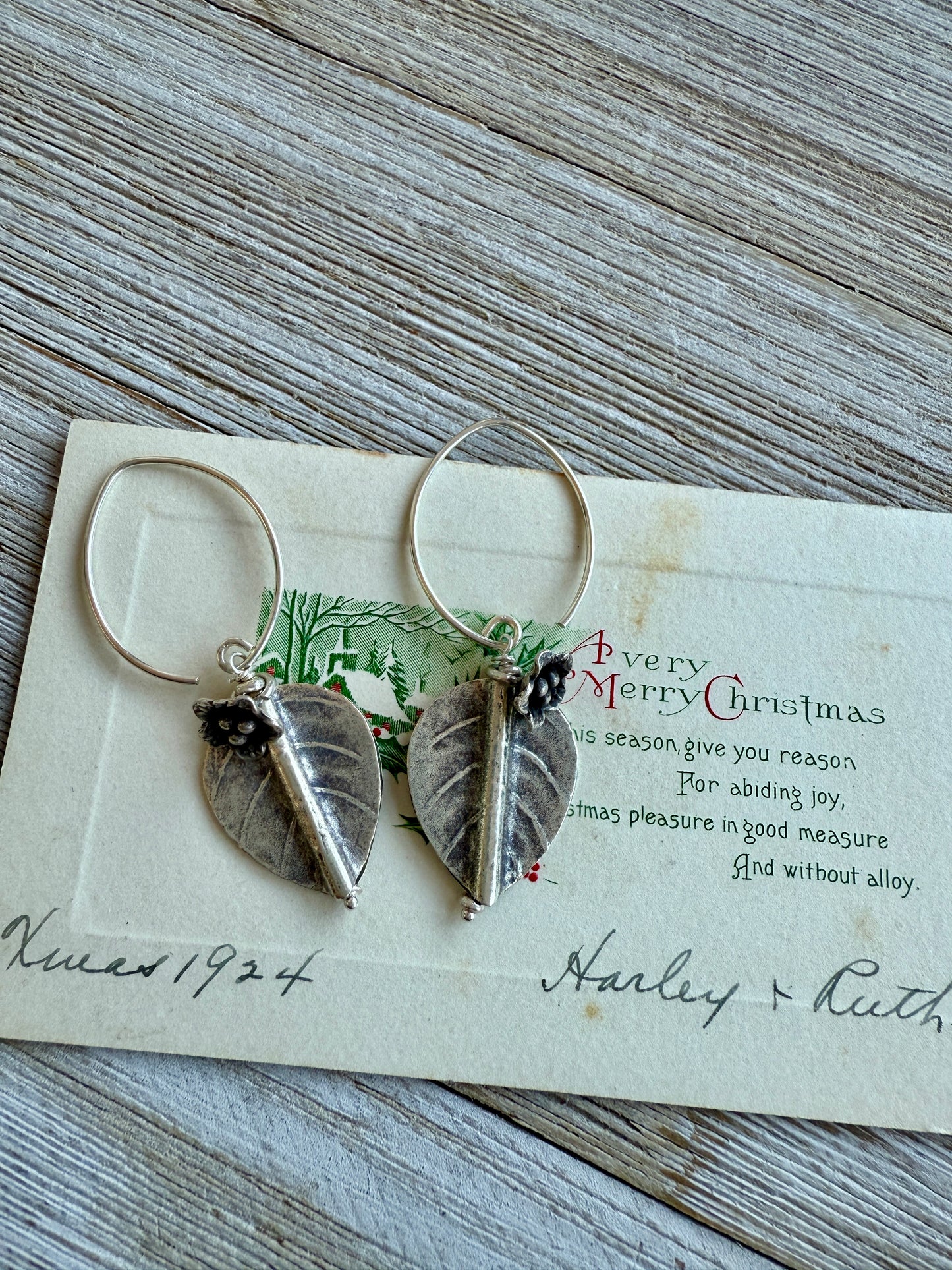 Fine silver leaf and flower earring on fine silver earwires.