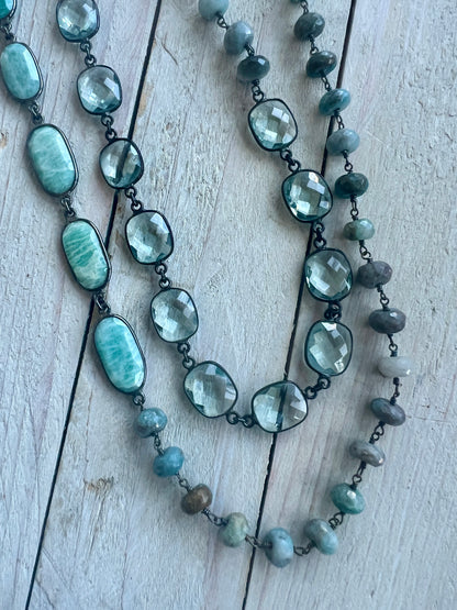 Beautiful aqua mix of green silverite, aqua crystal quartz, and Amazonite stones long necklace. 38”