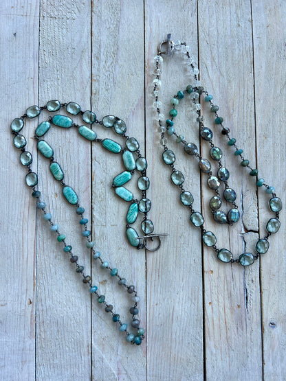 Beautiful aqua mix of green silverite, aqua crystal quartz, and Amazonite stones long necklace. 38”