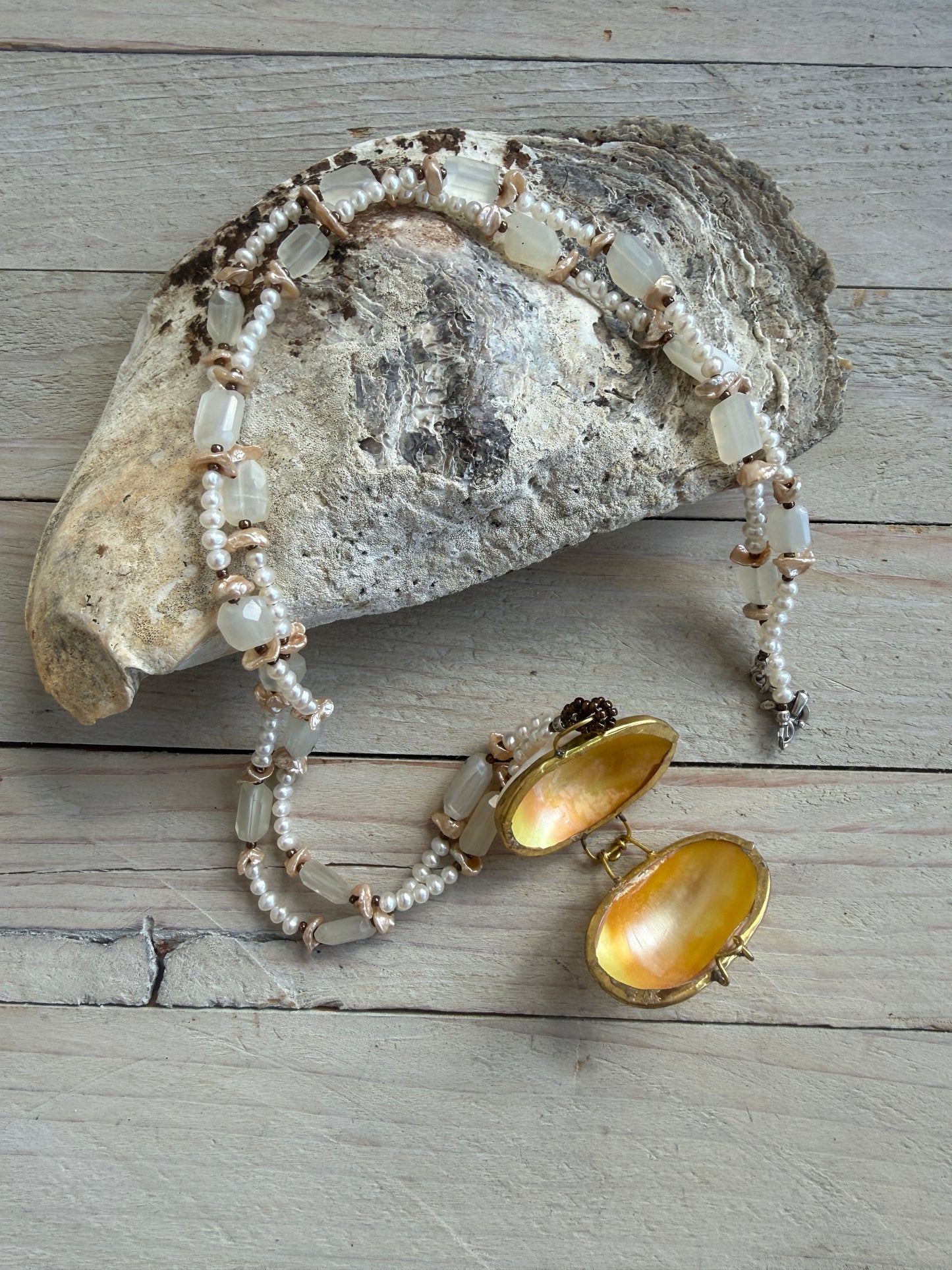 White shell pendant with moonstone and natural pearl necklace.