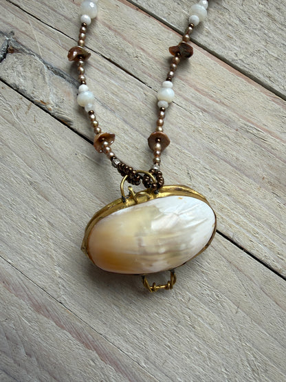 A vintage handcrafted shell ring box pendant with champagne pearls and moonstone long necklace.
