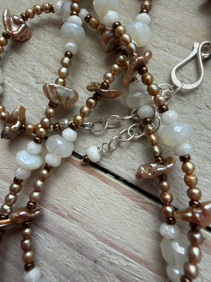 A vintage handcrafted shell ring box pendant with champagne pearls and moonstone long necklace.