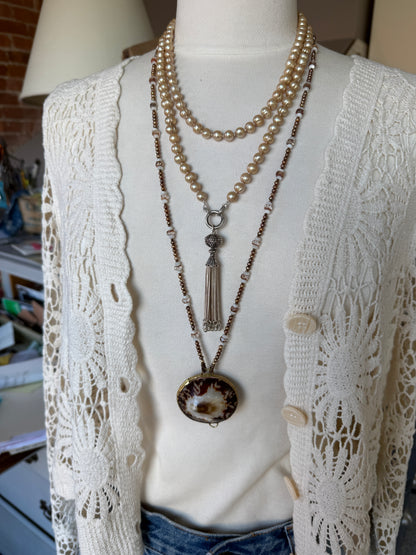 Champagne pearls with fine silver spacers and removable sterling tassel necklace.