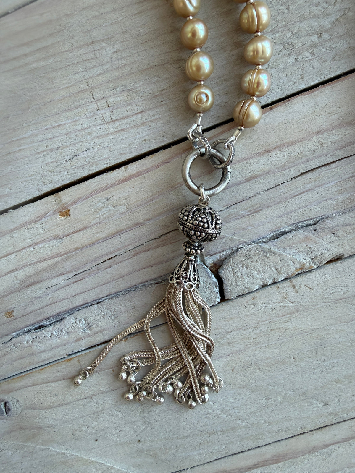 Champagne pearls with fine silver spacers and removable sterling tassel necklace.