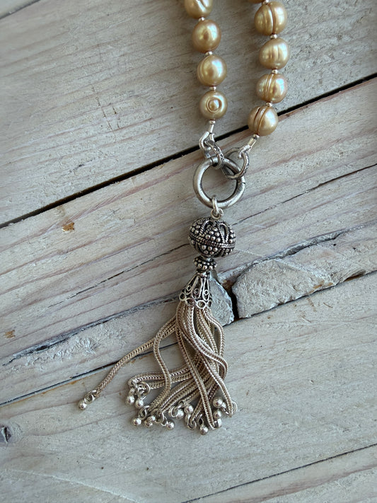 Champagne pearls with fine silver spacers and removable sterling tassel necklace.