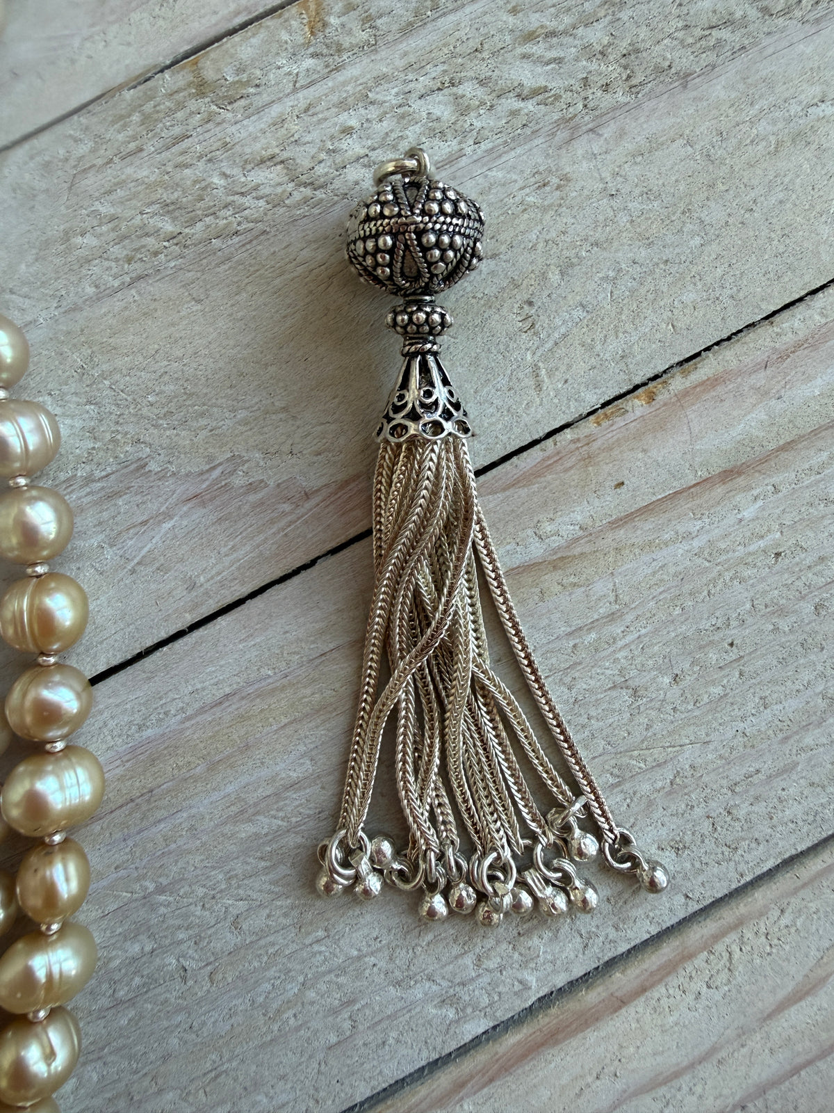 Champagne pearls with fine silver spacers and removable sterling tassel necklace.