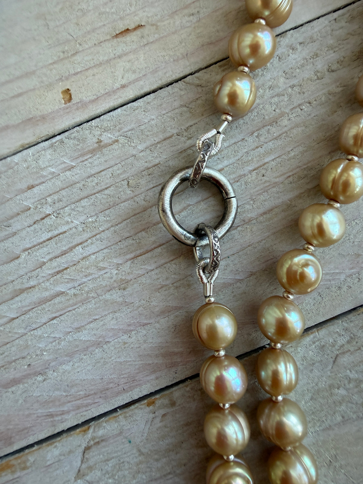 Champagne pearls with fine silver spacers and removable sterling tassel necklace.