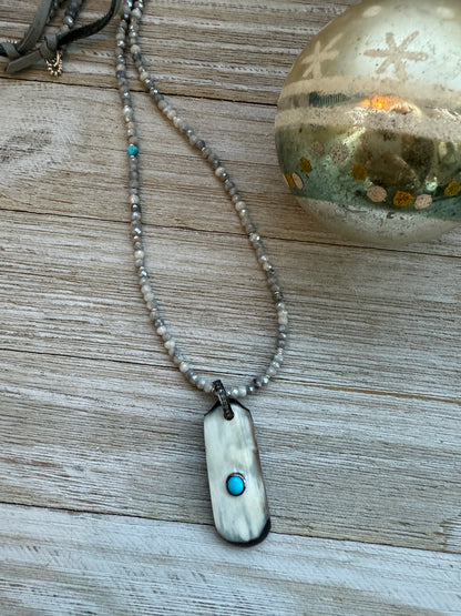 Creamy grey bone pendant with turquoise inlay and diamond bale on silverite and fine silver adjustable necklace.