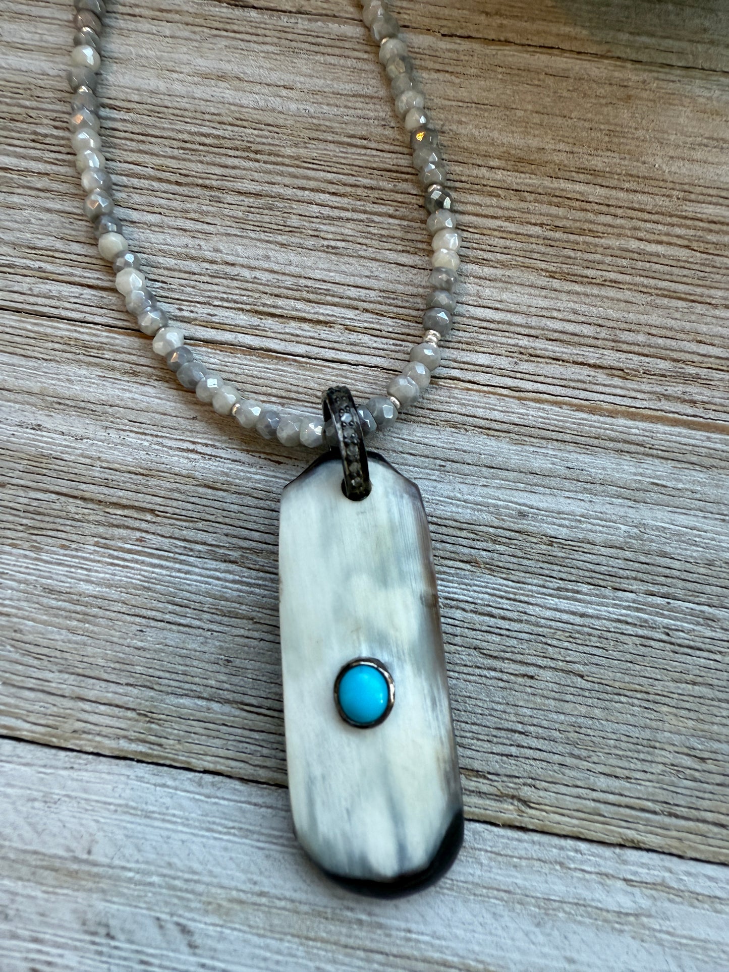 Creamy grey bone pendant with turquoise inlay and diamond bale on silverite and fine silver adjustable necklace.