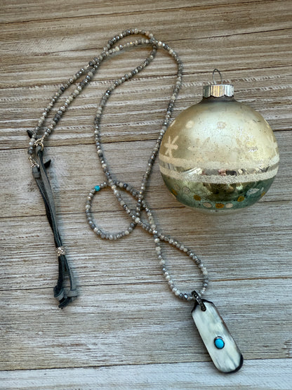 Creamy grey bone pendant with turquoise inlay and diamond bale on silverite and fine silver adjustable necklace.