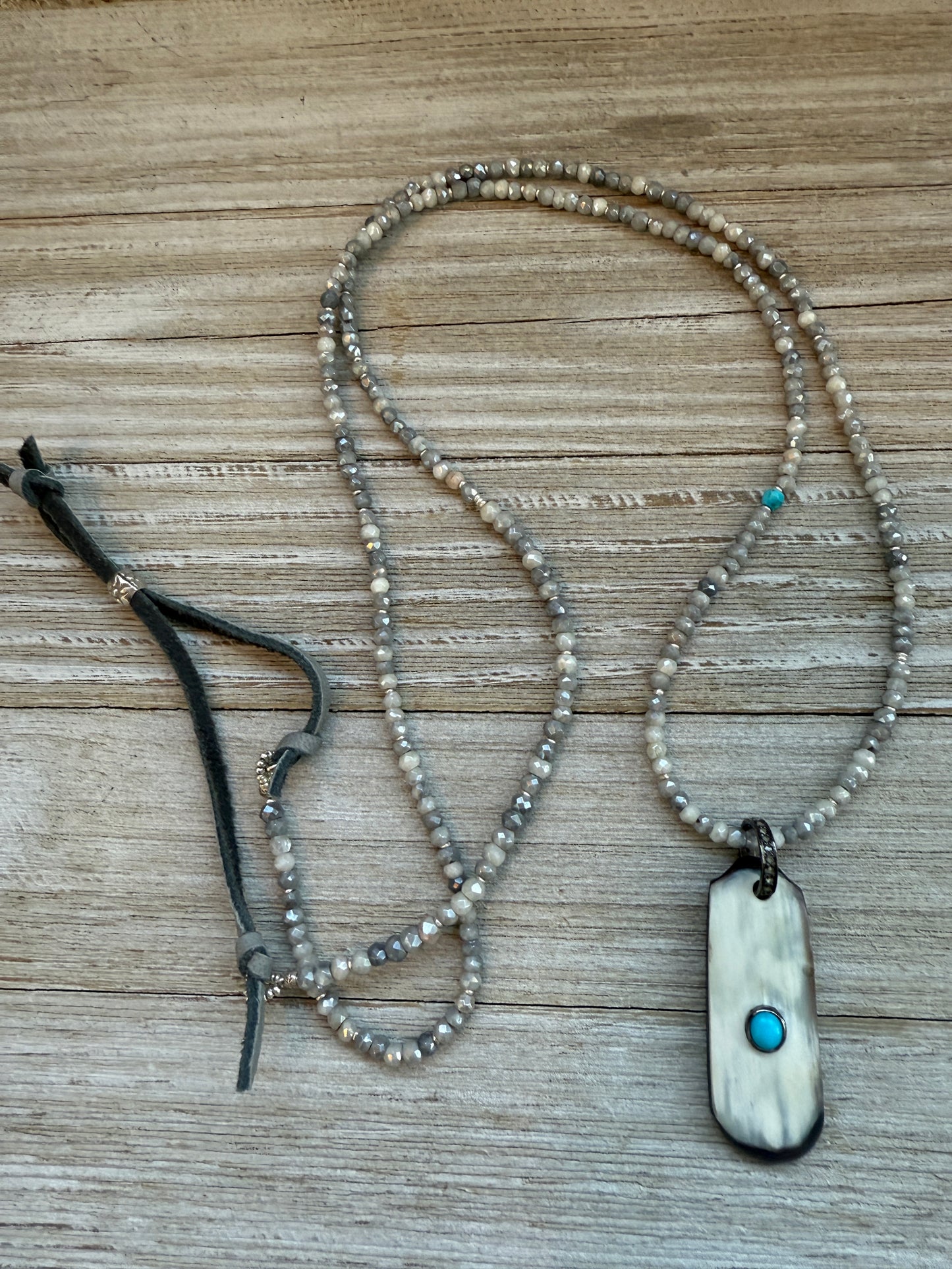 Creamy grey bone pendant with turquoise inlay and diamond bale on silverite and fine silver adjustable necklace.