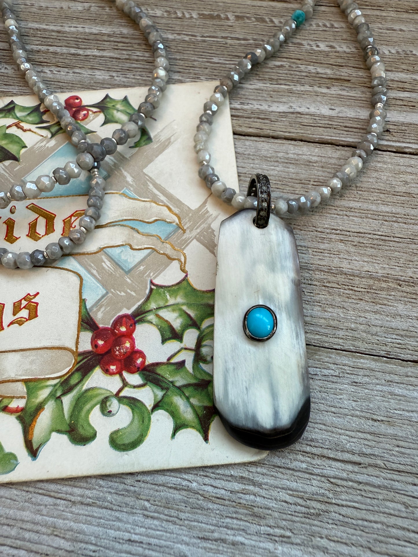 Creamy grey bone pendant with turquoise inlay and diamond bale on silverite and fine silver adjustable necklace.