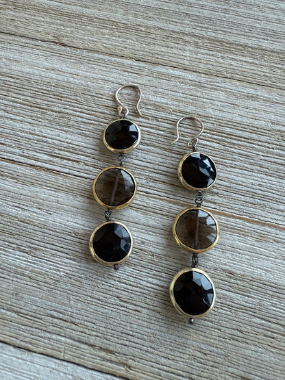 Faceted bezel set onyx and smoky quartz set in gold vermeil on fine silver earwires.