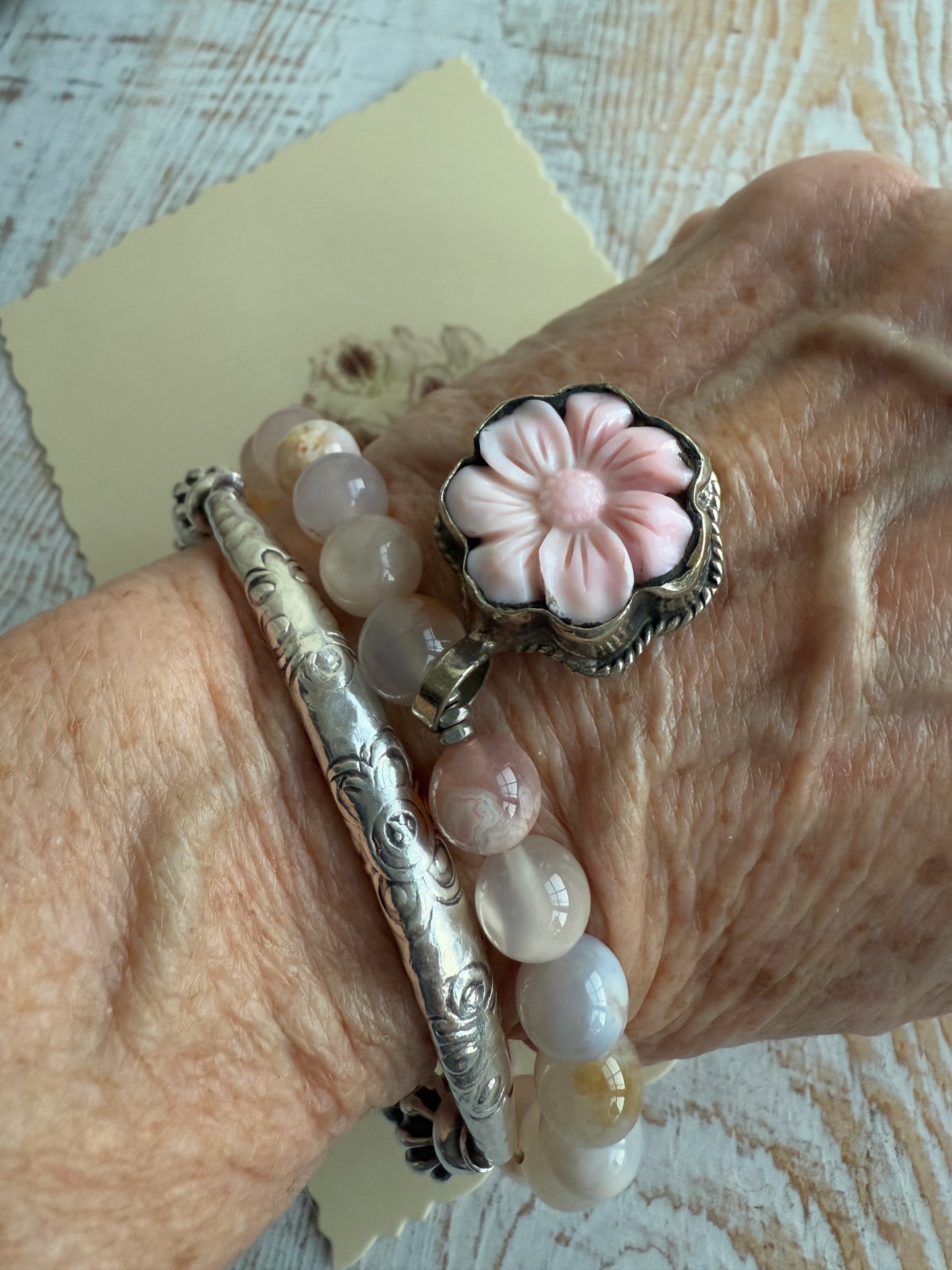 Cherry blossom agate beads with pink Peruvian Opal flower charm stack bracelet from Tibet. 7”