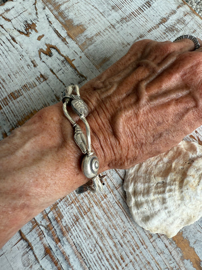 Fine silver sealife and shell bracelet with toggle clasp. 7”.