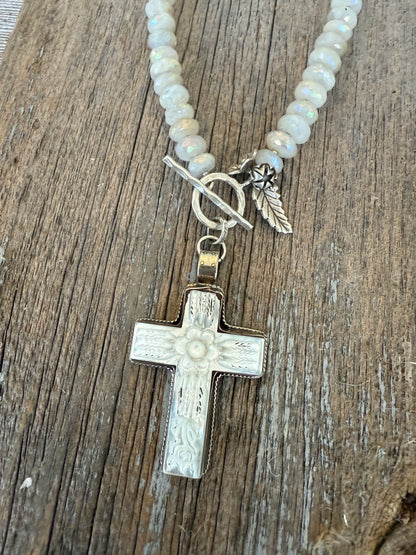 Mother of pearl carved cross on faceted moonstone short necklace. 18”