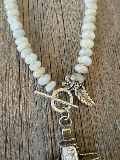 Mother of pearl carved cross on faceted moonstone short necklace. 18”