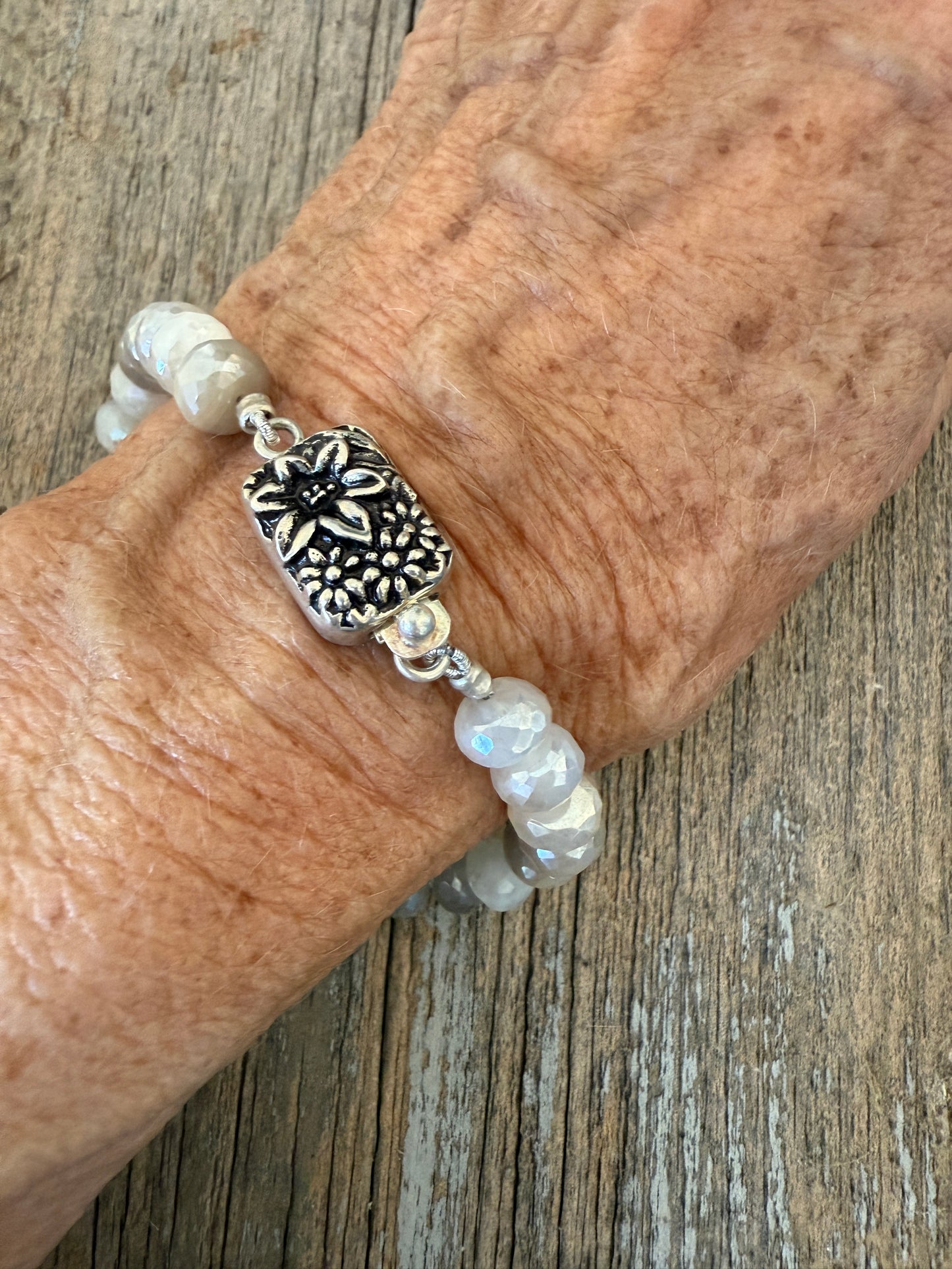 Moonstone bracelet with flower box clasp. 7”.