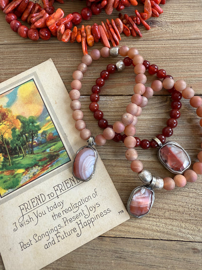 Agate charm surrounded by druzie agates stack stretch bracelet. 7”