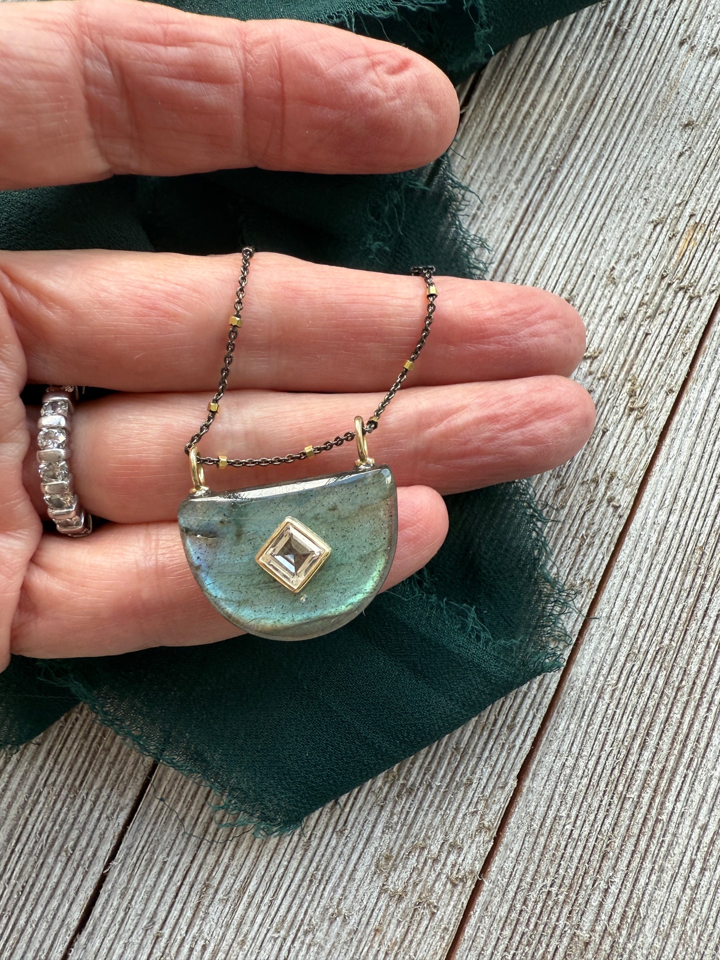 Labradorite half moon pendant with topaz on vermeil and sterling chain. 15.25-16.75”.