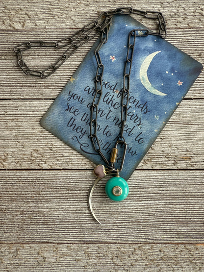 Rhodium sterling paperclip chain and carabiner clasp with turquoise and topaz, heart, and moon charms necklace.