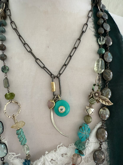 Rhodium sterling paperclip chain and carabiner clasp with turquoise and topaz, heart, and moon charms necklace.