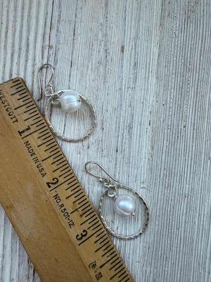 Handmade hammered fine silver hoops with pearl dangles earrings.