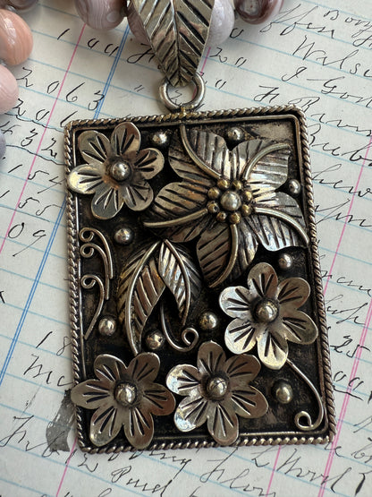 Hand knotted Botswana agates on silver flower pendant statement necklace.