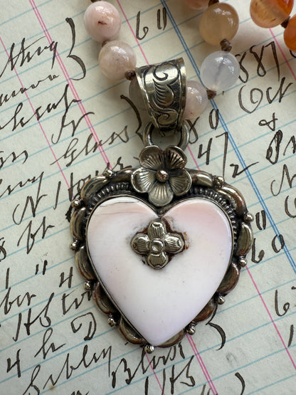 Cherry blossom agates hand knotted necklace with Peruvian Opal Tibetan heart pendant. 32.5-35.5”.
