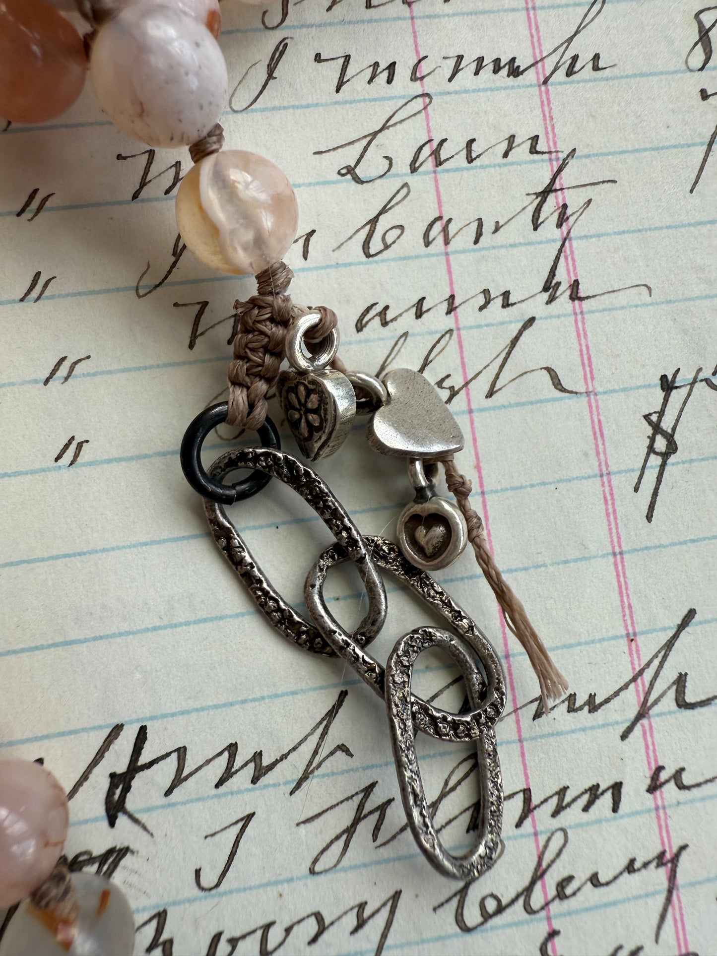 Cherry blossom agates hand knotted necklace with Peruvian Opal Tibetan heart pendant. 32.5-35.5”.