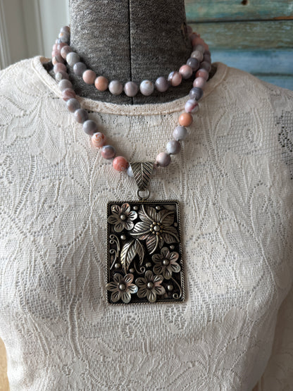 Hand knotted Botswana agates on silver flower pendant statement necklace.