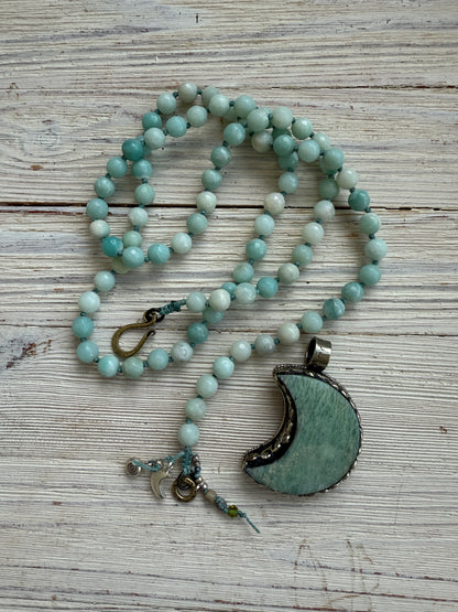 Tibetan amazonite crescent moon on knotted amazonite beads. 34”