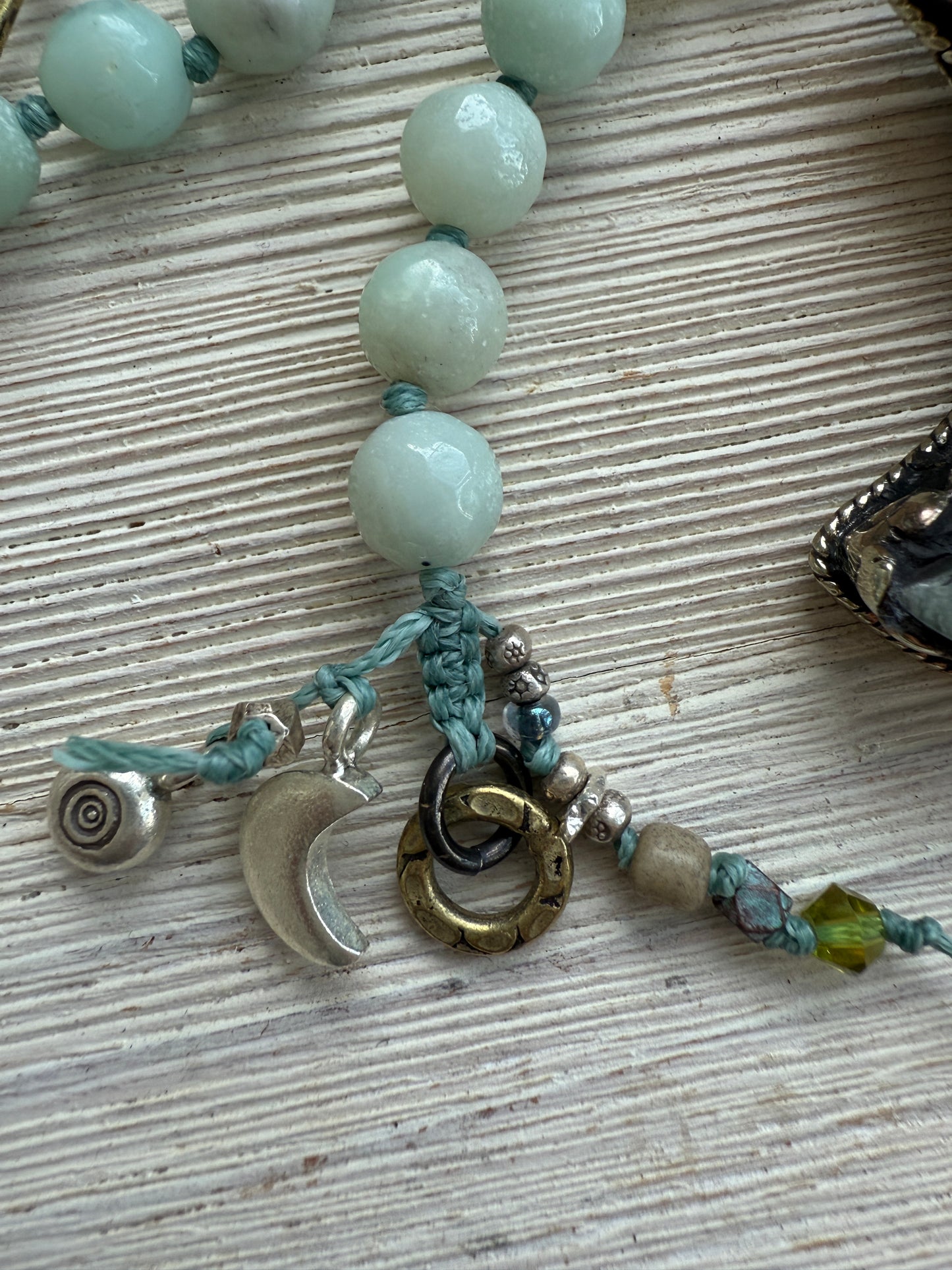 Tibetan amazonite crescent moon on knotted amazonite beads. 34”