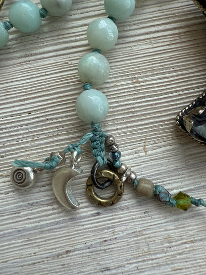 Tibetan amazonite crescent moon on knotted amazonite beads. 34”