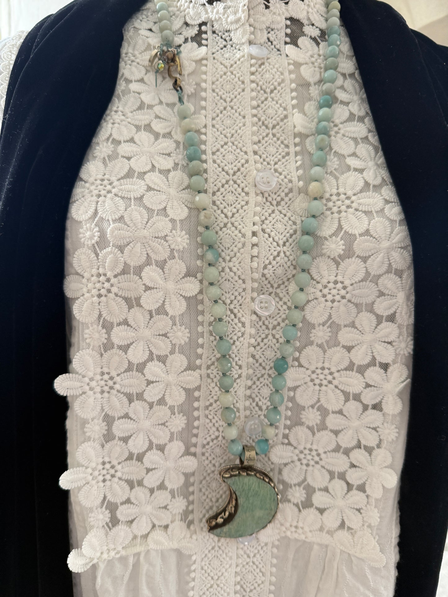 Tibetan amazonite crescent moon on knotted amazonite beads. 34”