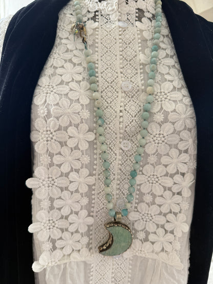 Tibetan amazonite crescent moon on knotted amazonite beads. 34”