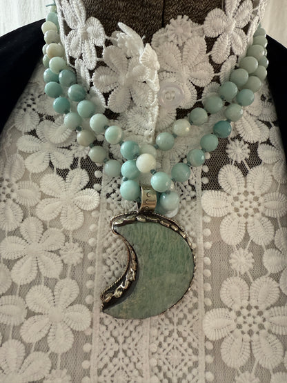 Tibetan amazonite crescent moon on knotted amazonite beads. 34”
