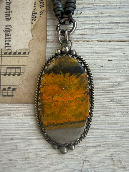 Tibetan bumblebee jasper pendant on knotted grey labradorite necklace. 33” long.