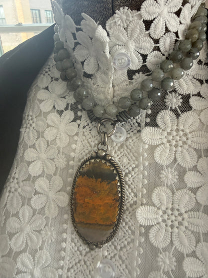 Tibetan bumblebee jasper pendant on knotted grey labradorite necklace. 33” long.