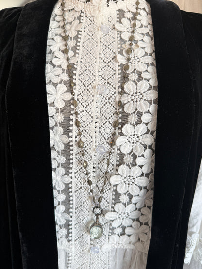 Antiqued sterling locket on faceted pyrite chain. 34” long necklace.