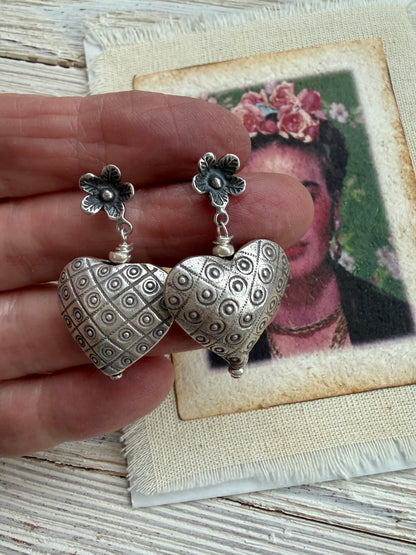 Fine silver puffy hearts on flower post earrings.