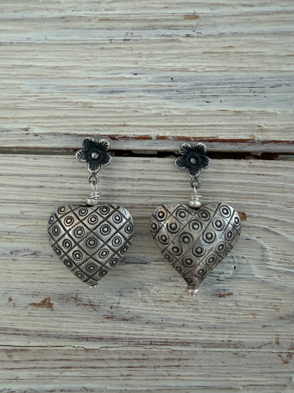 Fine silver puffy hearts on flower post earrings.