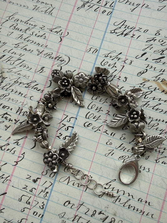 Fine silver leaves and flowers bracelet 7-8”.