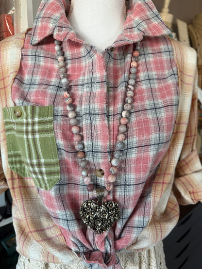 Tibetan flowered heart pendant on pink Botswana agates long necklace.