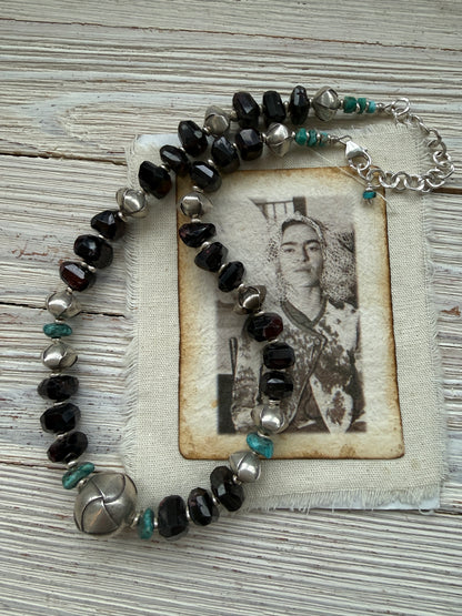 Faceted garnets with fine silver origami beads and turquoise necklace.