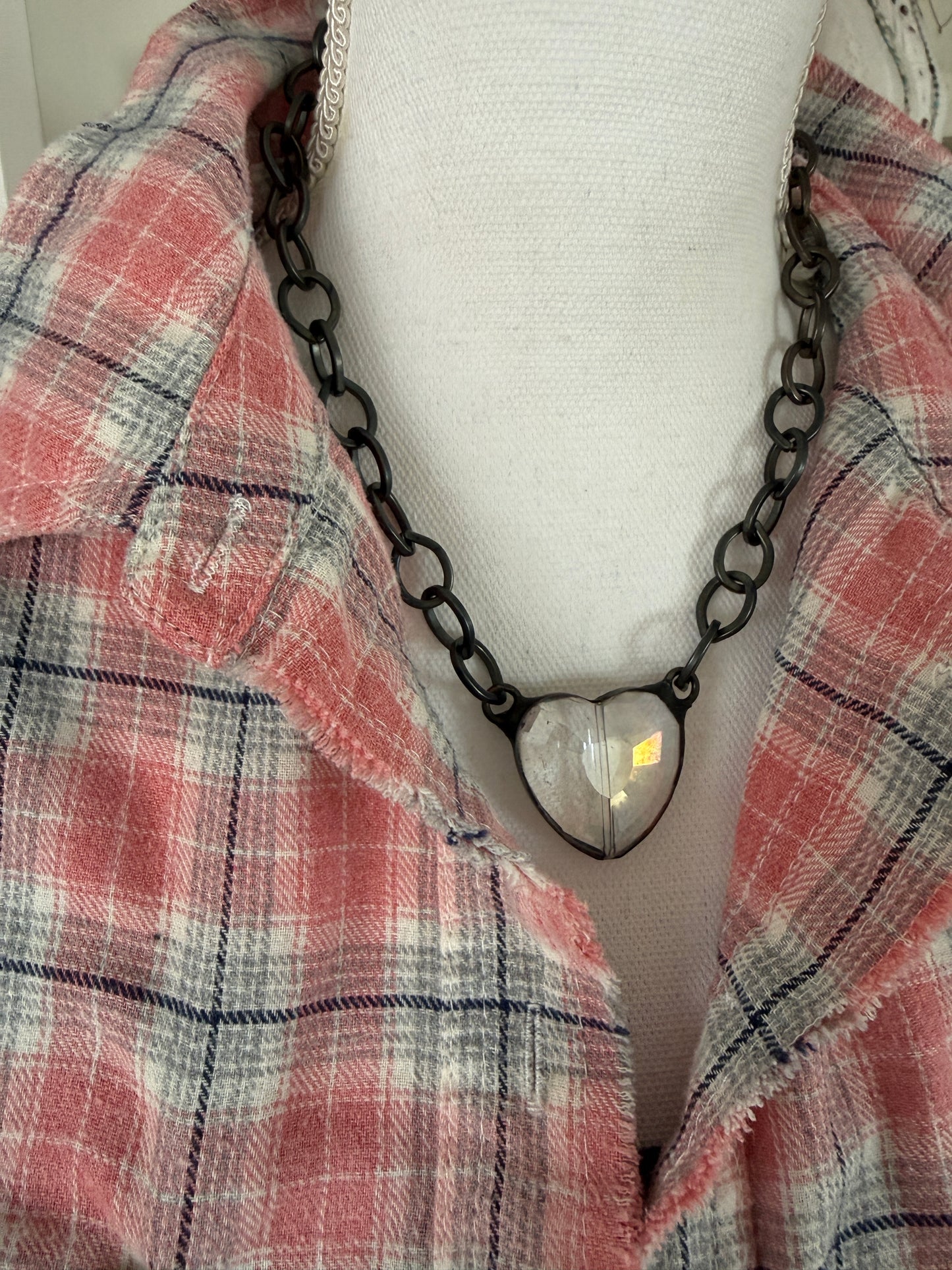 Prism crystal heart on gunmetal base metal chain necklace.