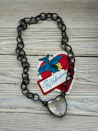 Prism crystal heart on gunmetal base metal chain necklace.